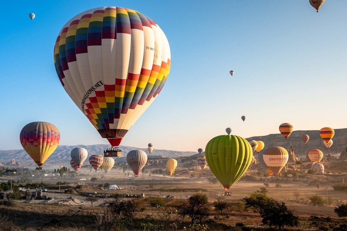 hot air balloon ride during sunrise